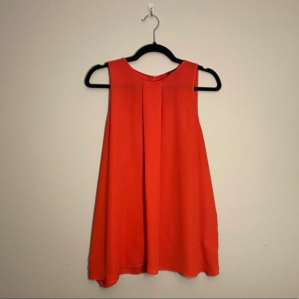 Coral flowy sleeveless blouse